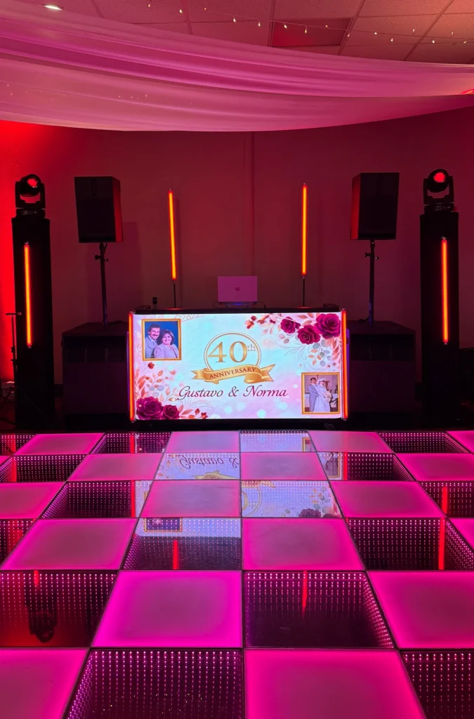 DJ sound system, red event lighting and LED dance floor at a Los Angeles anniversary party