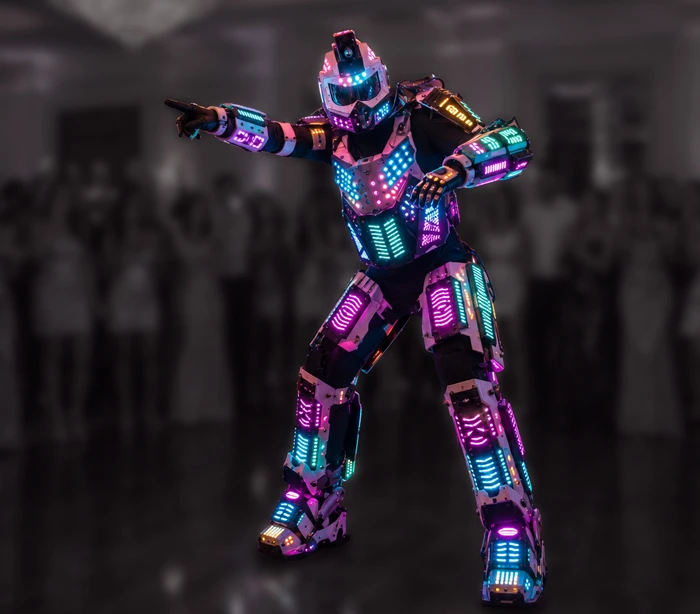 Colorful LED robot performer wearing a suit covered with blue, pink and green lights