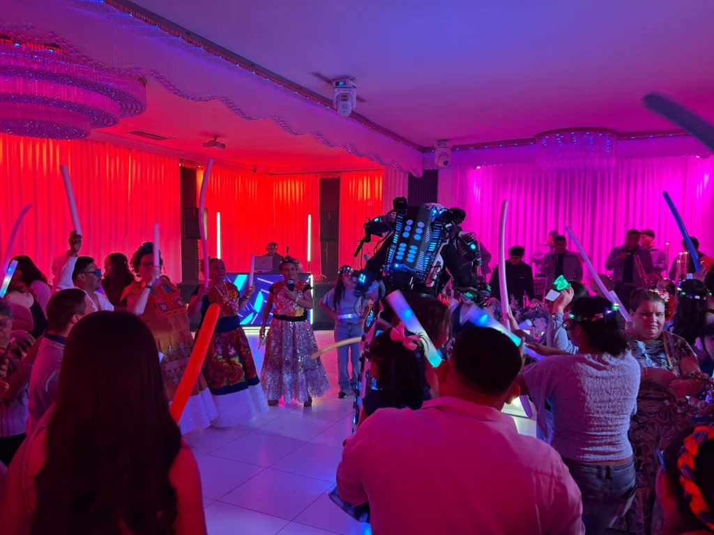 LED robot show surrounded by guests at a quinceañera party in Los Angeles