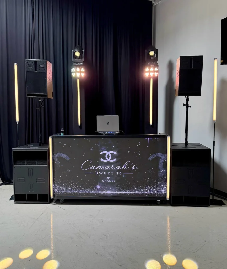 Sweet 16 DJ booth with speakers, subwoofers and event lighting in Los Angeles